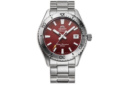 Silver wristwatch with a red face on a white background