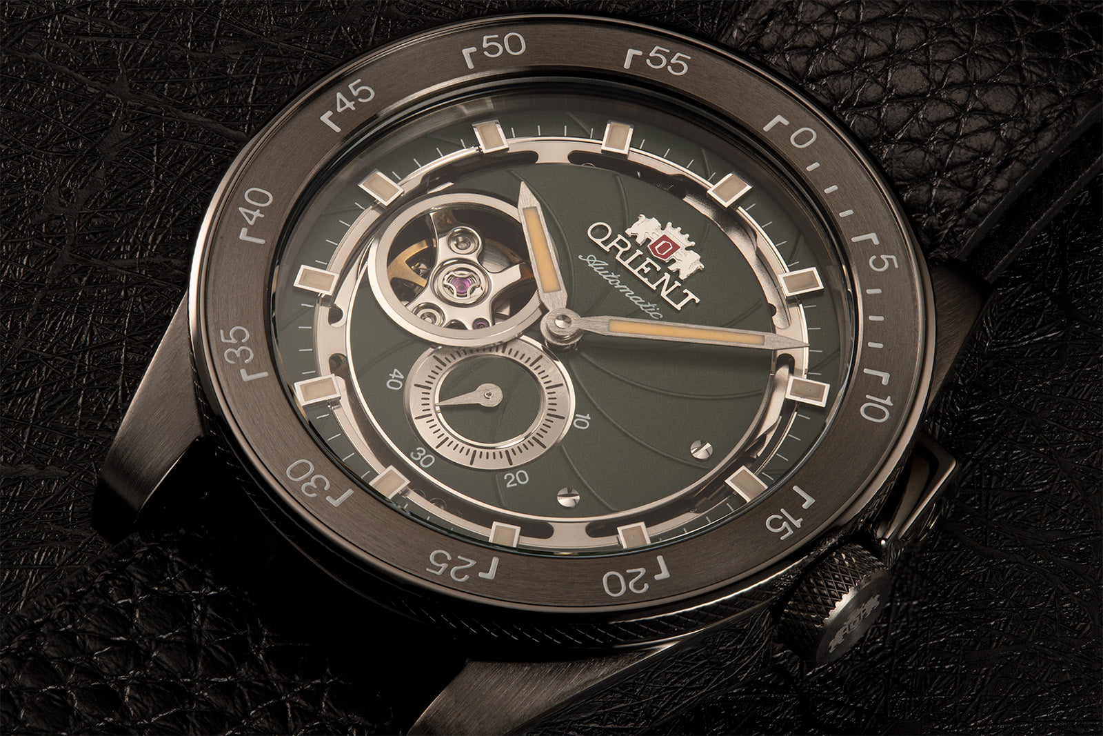Orient Retro Future Camera RA-AR0202E10B sport watch open heart black green